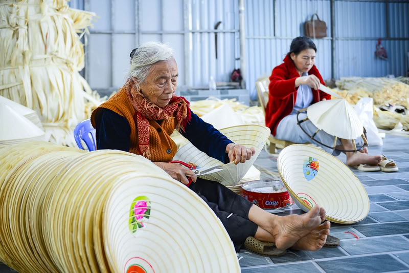 au village de Chuong, réputé pour ses chapeaux