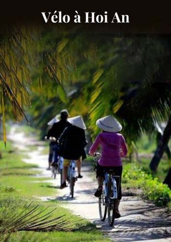 Campagne paisible des cyclistes à Hoi An