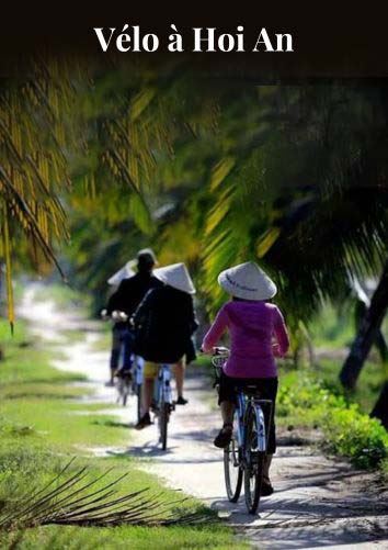 Campagne paisible des cyclistes à Hoi An