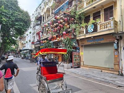 Cyclo-pousse dans le vieux quartier de Hanoï